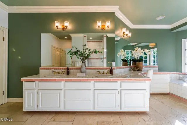 a livingroom with furniture and a bookshelf
