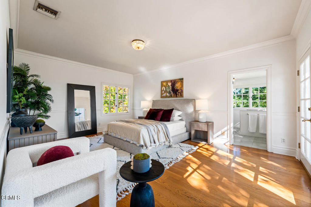 427 Long Canyon Road Bradbury, CA 91008 - Photo 32 of 62 a bedroom with a bed and a couch