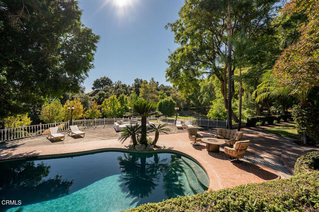 427 Long Canyon Road Bradbury, CA 91008 - Photo 41 of 62 a view of a lake with a yard