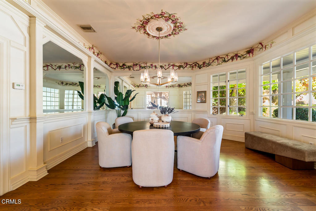 427 Long Canyon Road Bradbury, CA 91008 - Photo 6 of 62 a living room with furniture and a chandelier