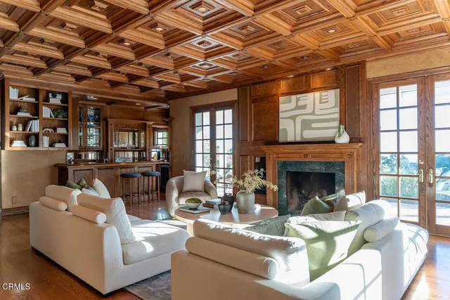 a open kitchen with stainless steel appliances granite countertop a sink and a counter top space