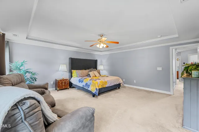 a spacious bathroom with a double vanity sink mirror and double