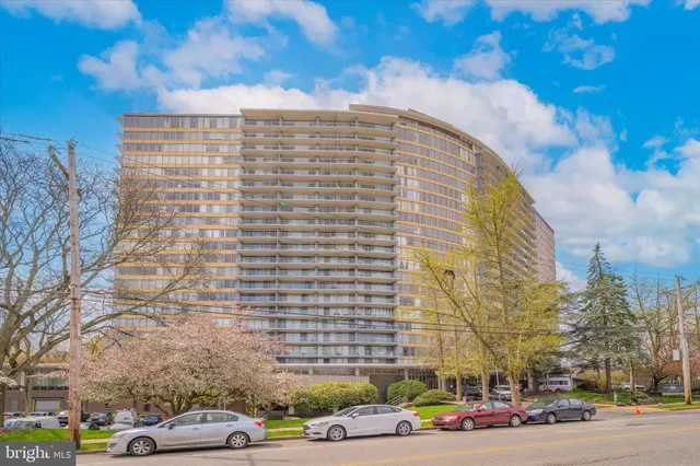a city street lined with buildings and cars
