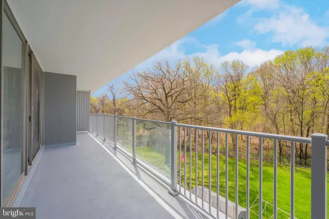 a view of balcony with furniture