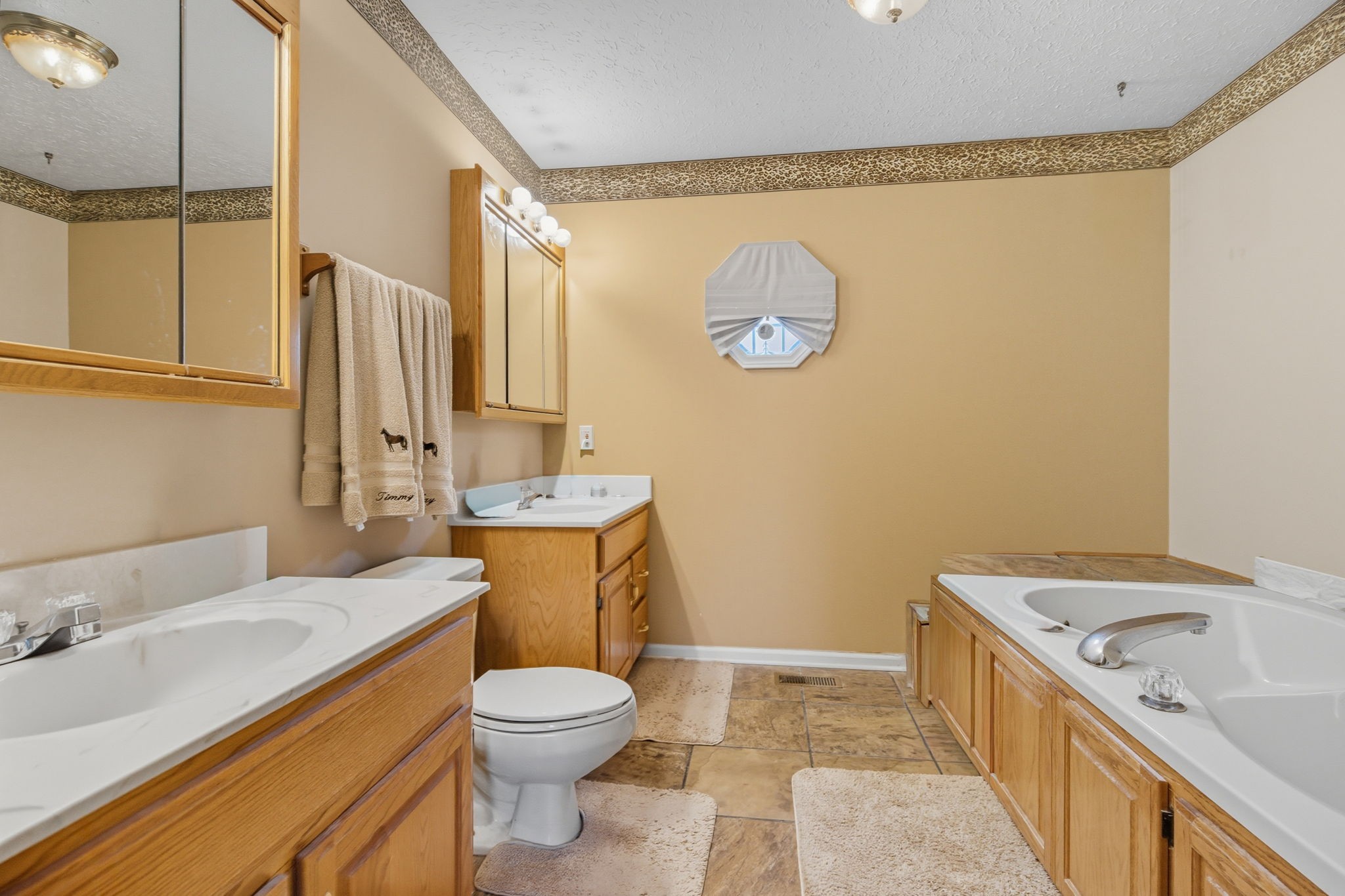 1021 Maple Grove Road Lafayette, TN 37083 - Photo 12 of 49 a bathroom with a granite countertop sink toilet and shower