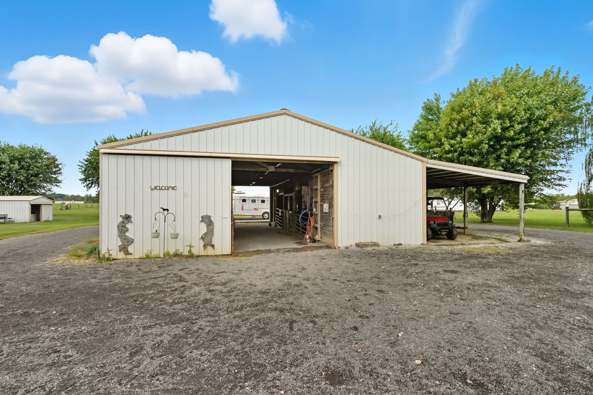 1021 Maple Grove Road Lafayette, TN 37083 - Photo 21 of 49 a view of a house with a yard