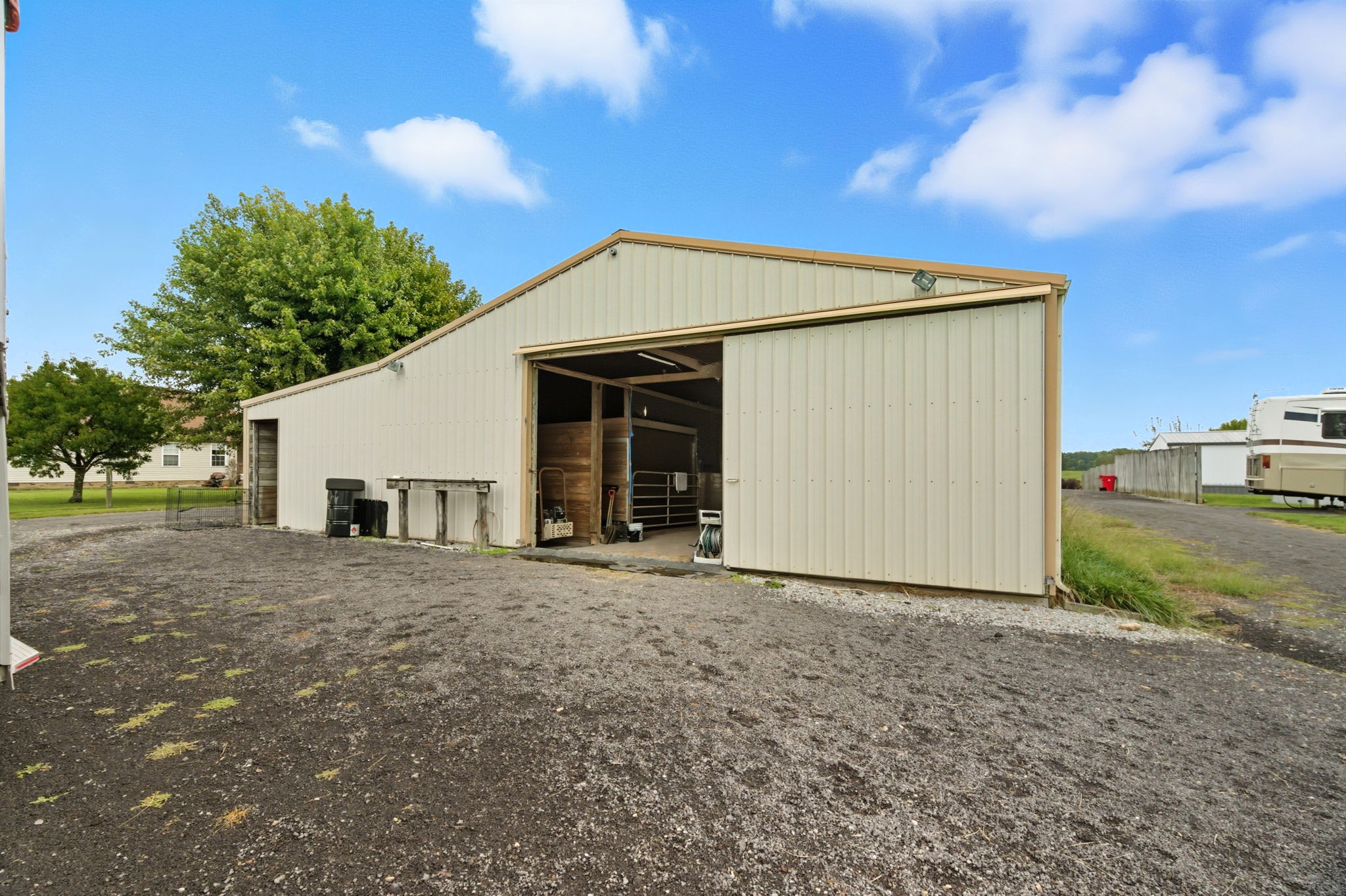 1021 Maple Grove Road Lafayette, TN 37083 - Photo 22 of 49 a view of a house with backyard