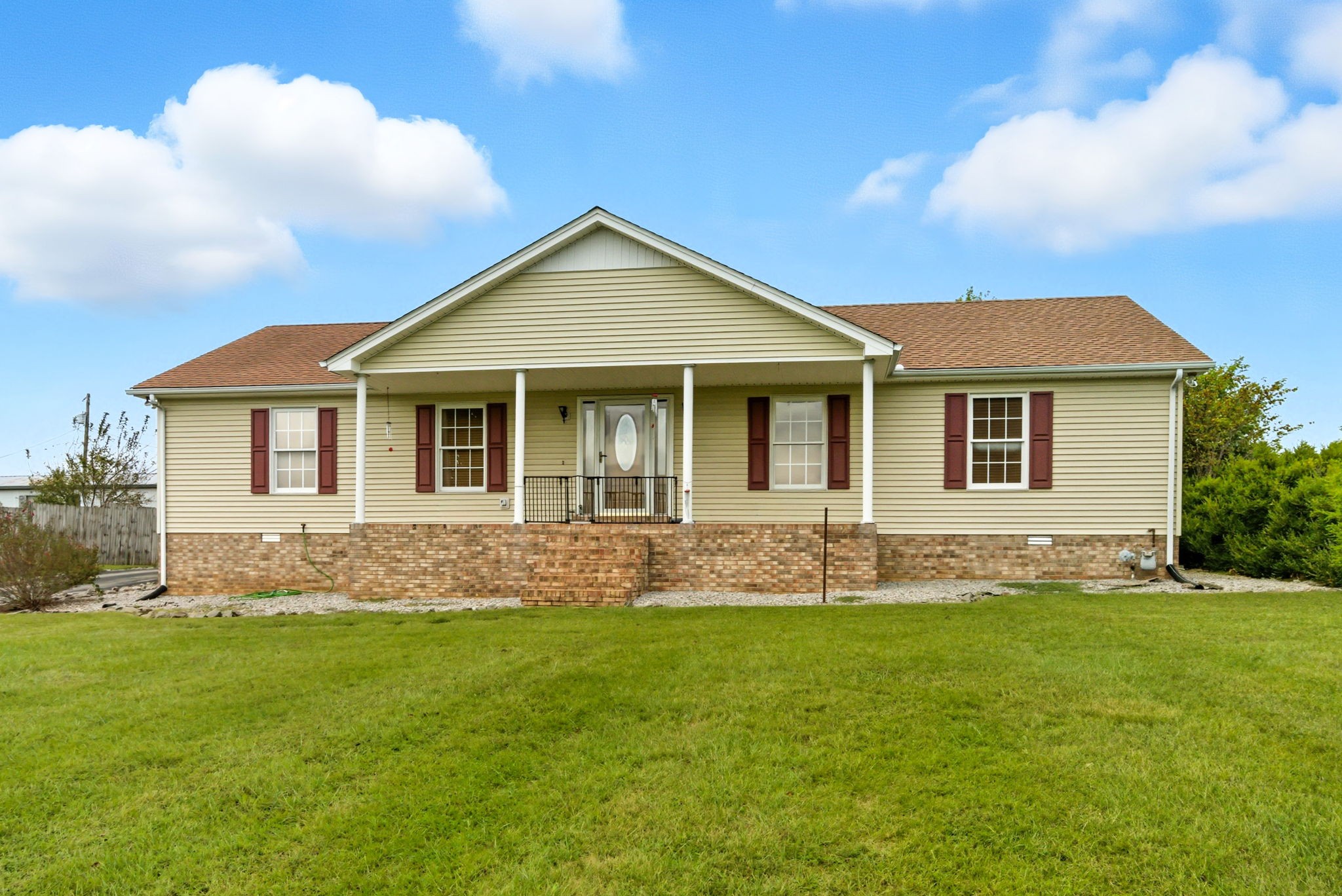 1021 Maple Grove Road Lafayette, TN 37083 - Photo 35 of 49 a front view of house with yard and green space