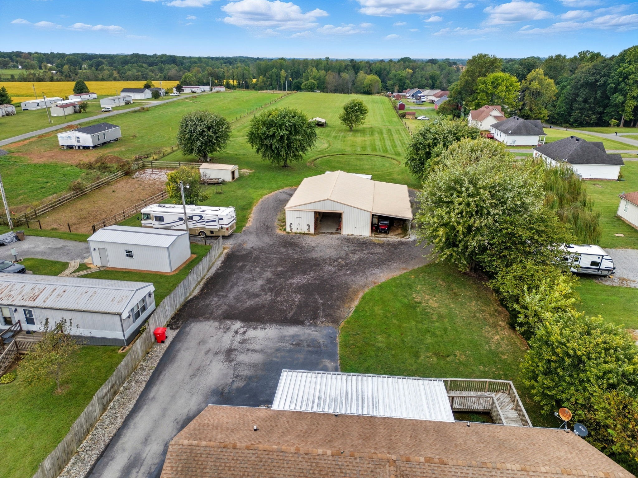 1021 Maple Grove Road Lafayette, TN 37083 - Photo 39 of 49 an aerial view of a house with a garden