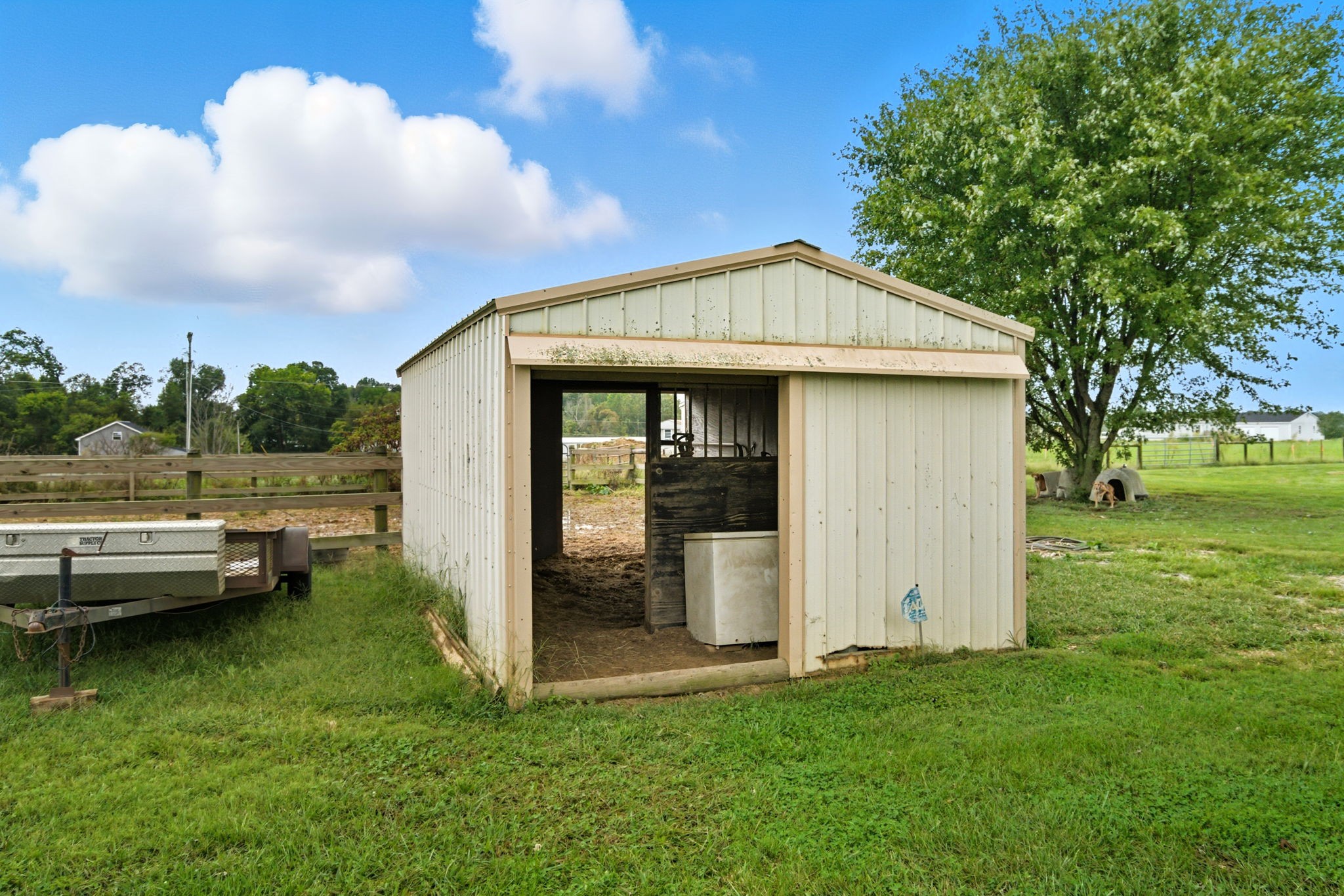 1021 Maple Grove Road Lafayette, TN 37083 - Photo 43 of 49 a view of a house with a backyard
