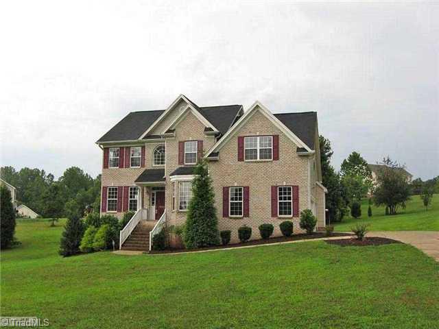 7995 Fogleman Road Oak Ridge, NC 27310 - Photo 1 of 16 Exterior Front.