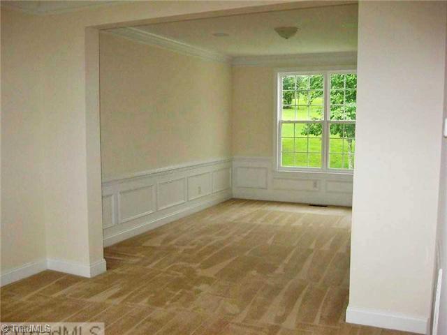7995 Fogleman Road Oak Ridge, NC 27310 - Photo 2 of 16 Dining Room.