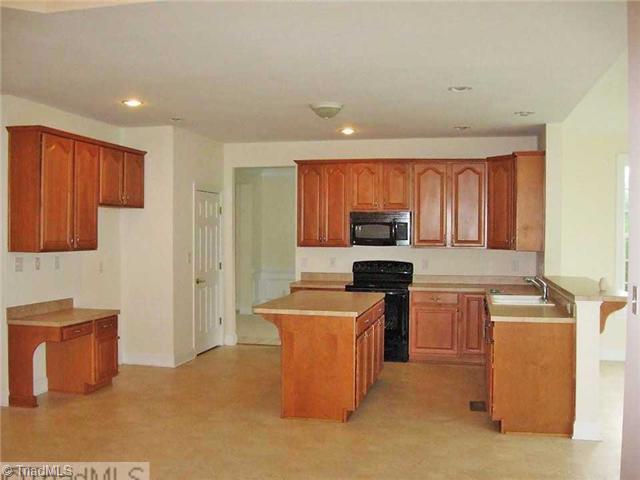 7995 Fogleman Road Oak Ridge, NC 27310 - Photo 5 of 16 Kitchen.