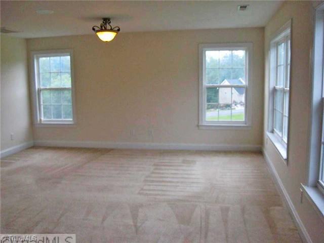 7995 Fogleman Road Oak Ridge, NC 27310 - Photo 9 of 16 Master Bedroom.