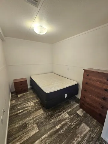 a room with a bed and a table