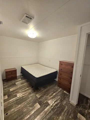 a room with pool table and flat screen tv