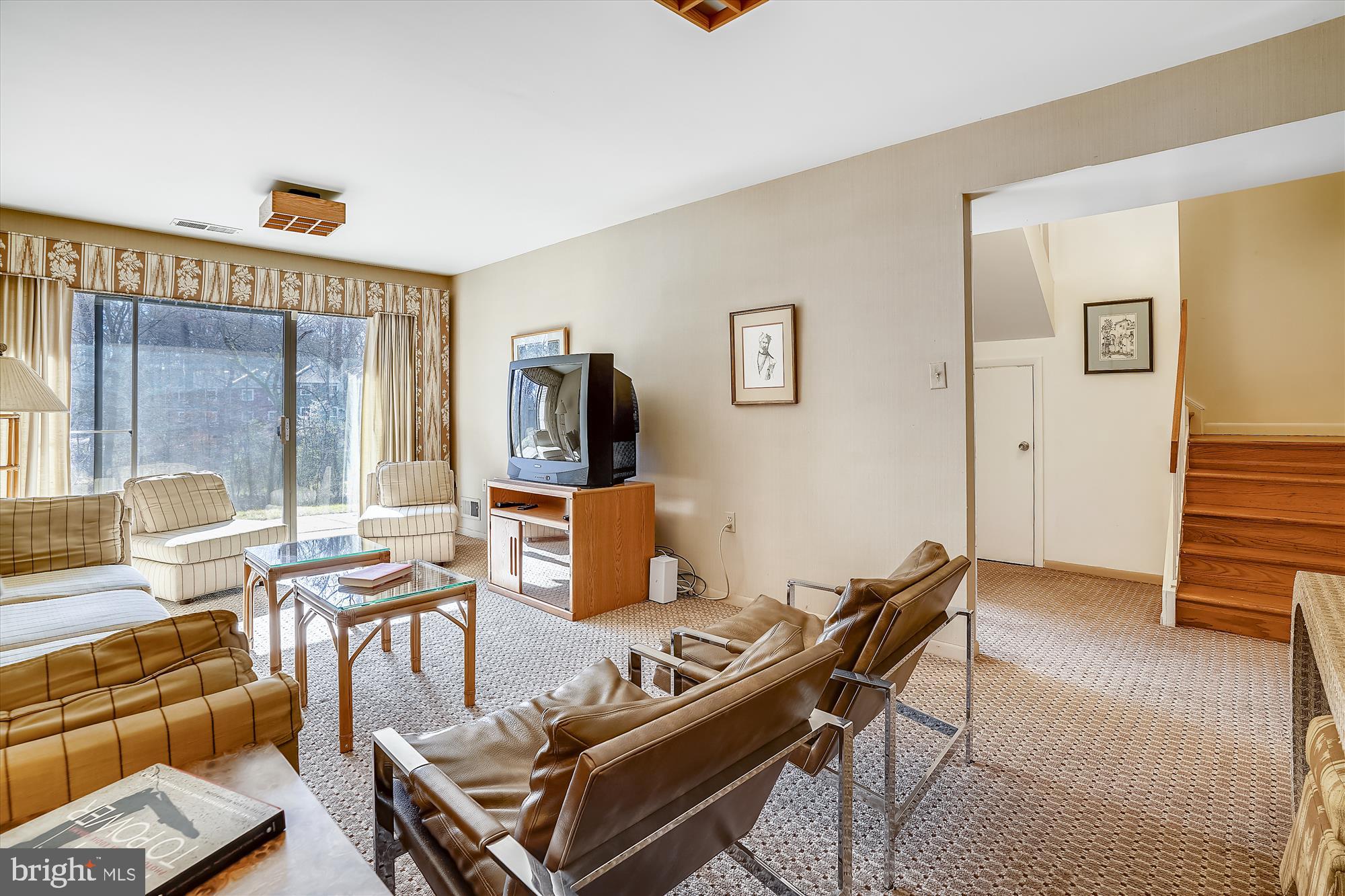 11153 Saffold Way Reston, VA 20190 - Photo 37 of 91 a living room with furniture and a window