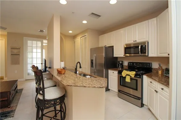 $5,500 | 1360 Sweetwater Cove, Unit 202, Naples, FL 34110