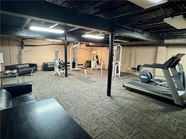 a view of a room with gym equipment