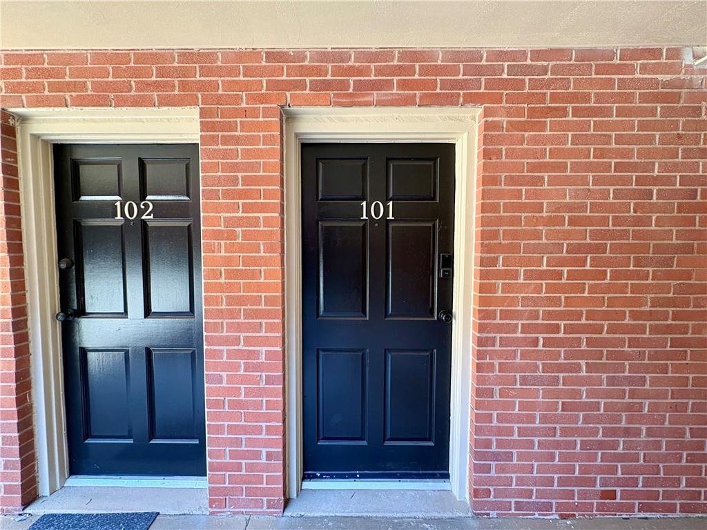 250 Little Street, Unit C101 Athens, GA 30605 - Photo 10 of 16 a view of front door of residential house and wooden door