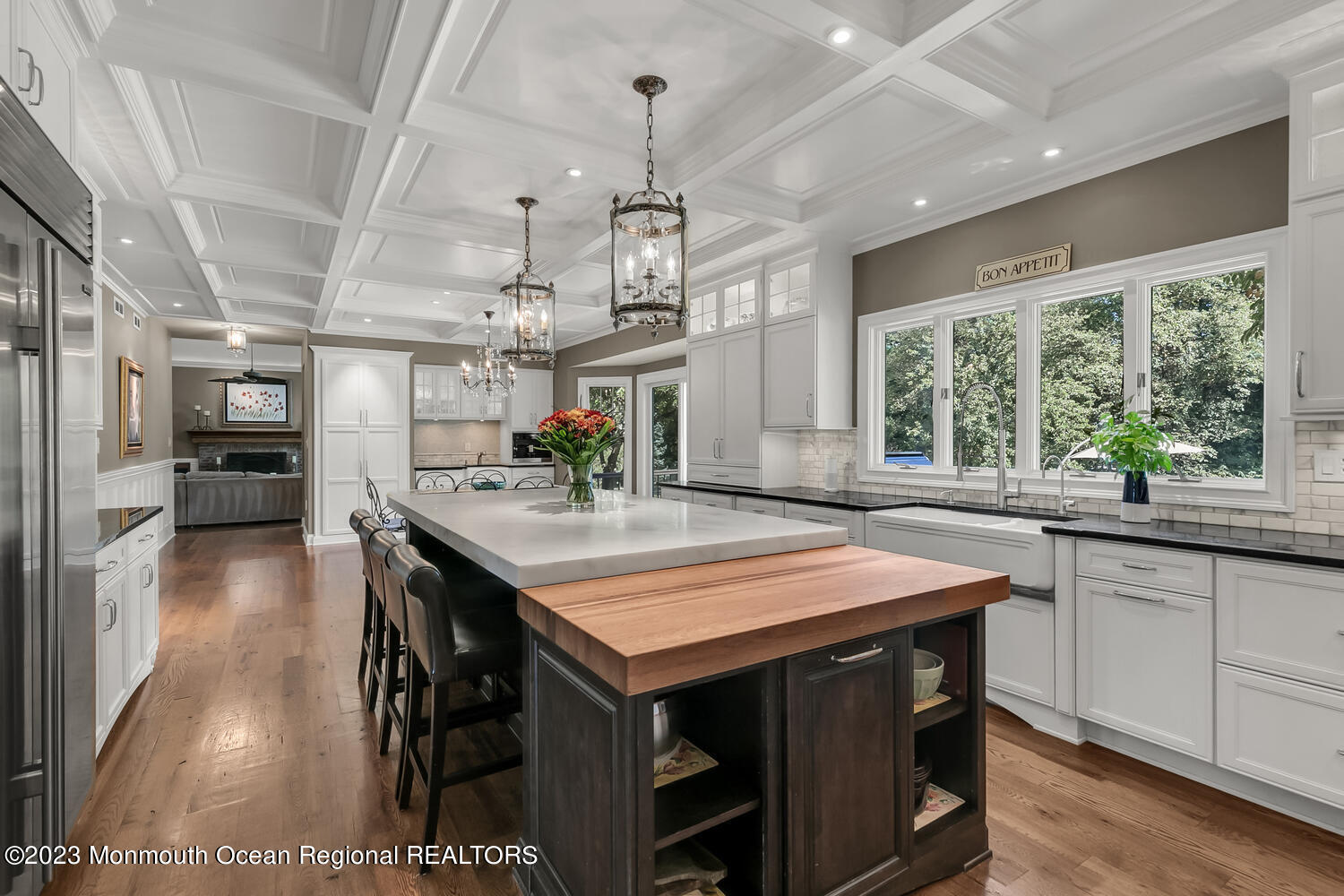 3 Goose Point Drive Colts Neck, NJ 07722 - Photo 13 of 66 a kitchen with stainless steel appliances granite countertop a stove a refrigerator a sink dishwasher with a dining table and chairs