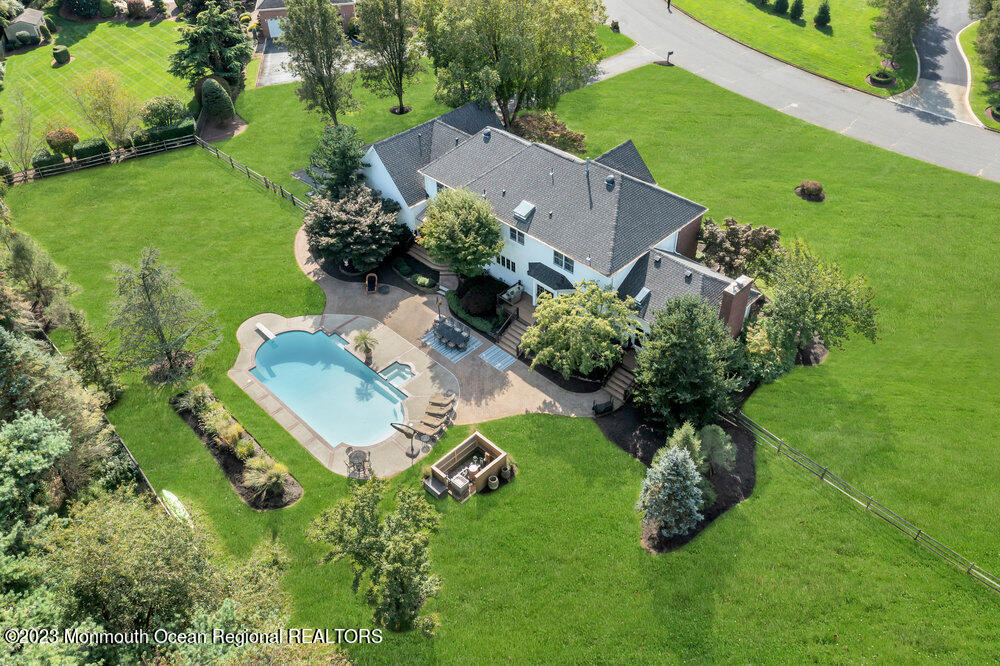 3 Goose Point Drive Colts Neck, NJ 07722 - Photo 3 of 66 an aerial view of a house with a yard