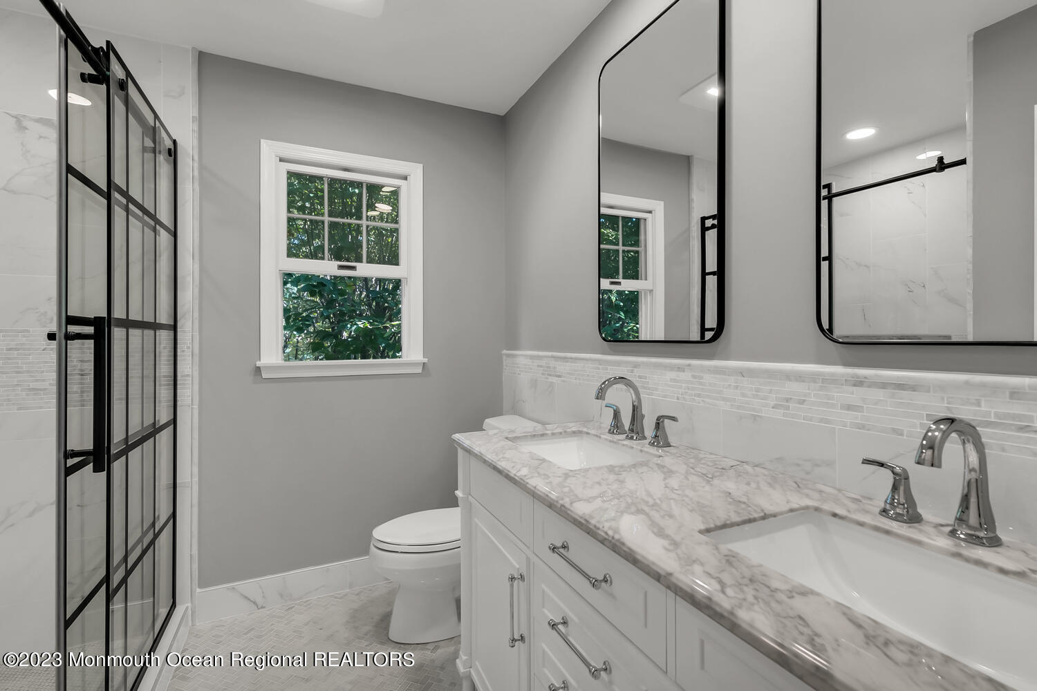 3 Goose Point Drive Colts Neck, NJ 07722 - Photo 31 of 66 a bathroom with a granite countertop toilet sink and mirror