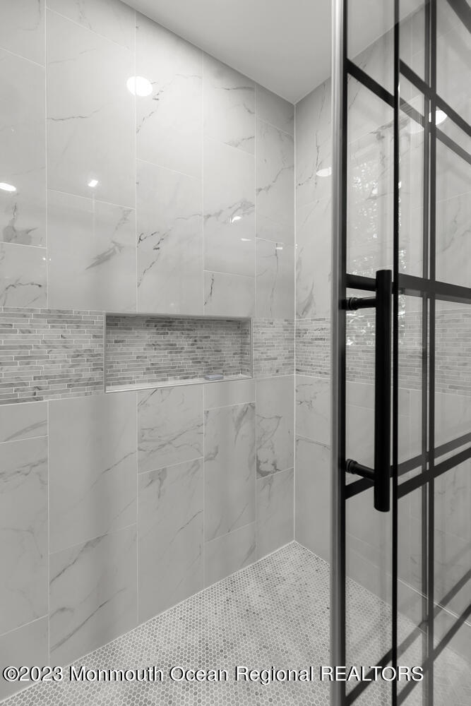 3 Goose Point Drive Colts Neck, NJ 07722 - Photo 33 of 66 a bathroom with a shower