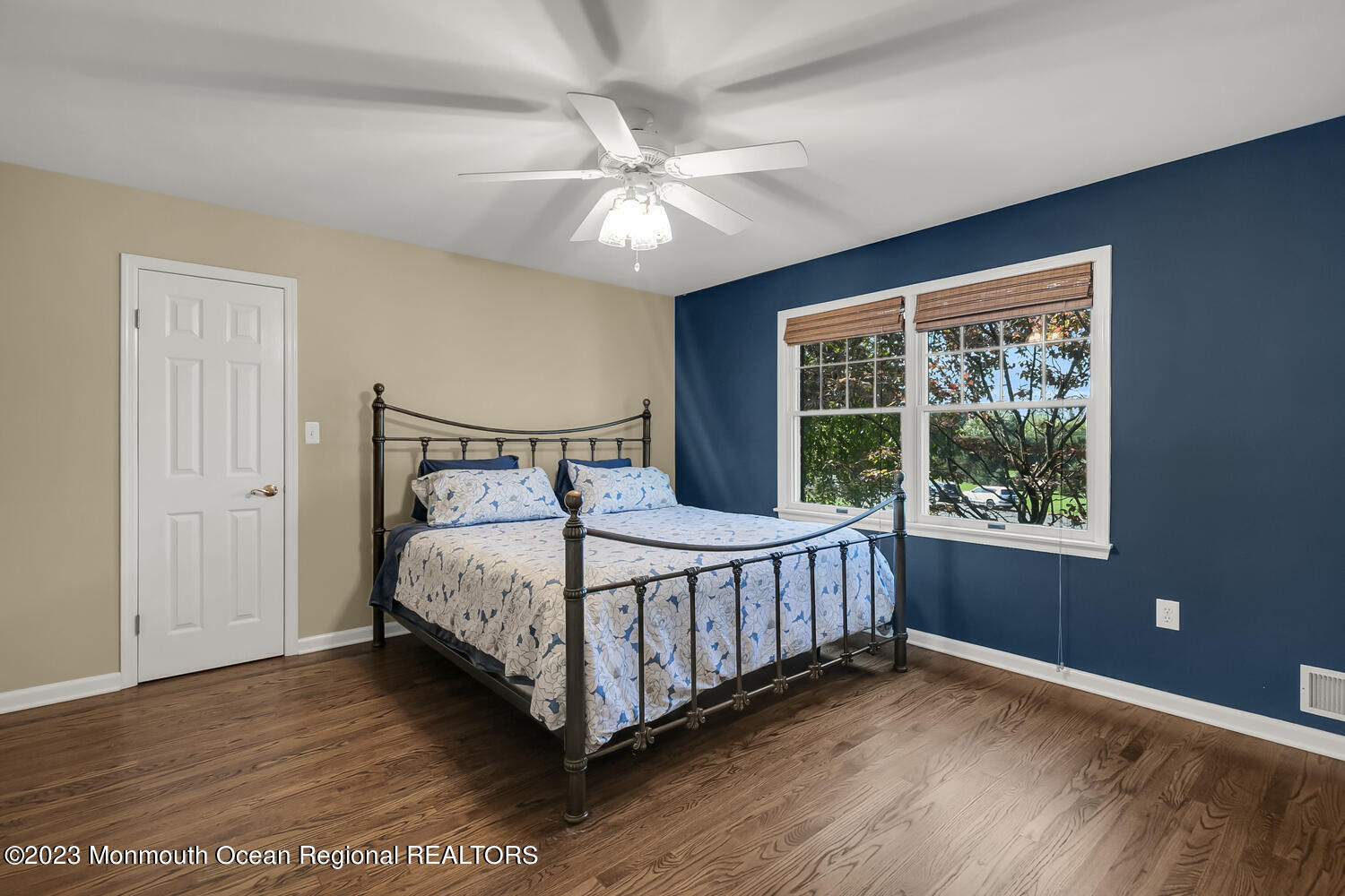 3 Goose Point Drive Colts Neck, NJ 07722 - Photo 34 of 66 a bedroom with a bed window and wooden floor