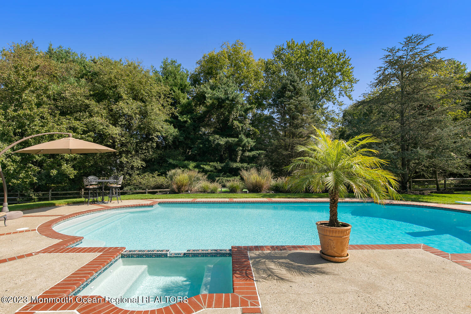 3 Goose Point Drive Colts Neck, NJ 07722 - Photo 43 of 66 a view of a swimming pool with a yard