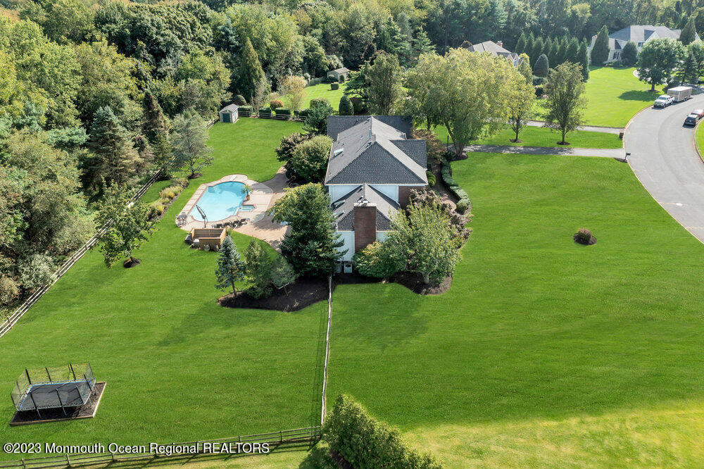 3 Goose Point Drive Colts Neck, NJ 07722 - Photo 48 of 66 a view of a house with a backyard
