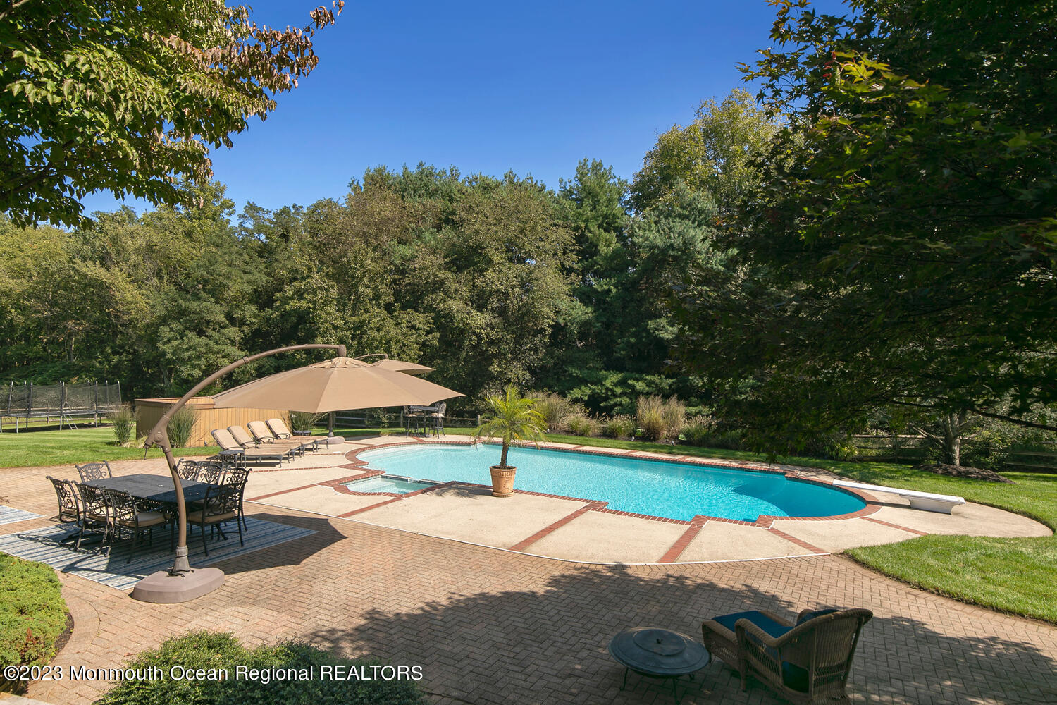 3 Goose Point Drive Colts Neck, NJ 07722 - Photo 60 of 66 an outdoor space with pool and furniture