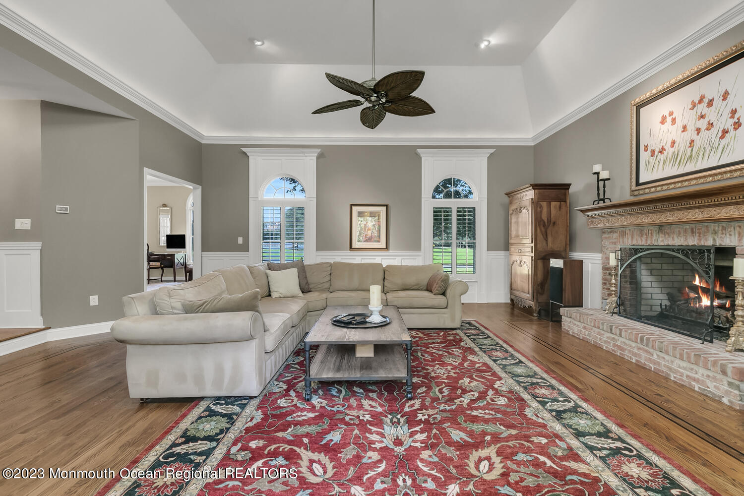 3 Goose Point Drive Colts Neck, NJ 07722 - Photo 9 of 66 a living room with furniture and a fireplace