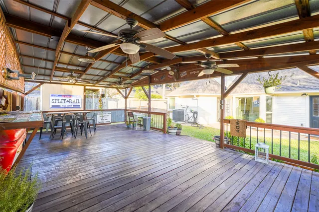 a view of a swimming pool with a porch