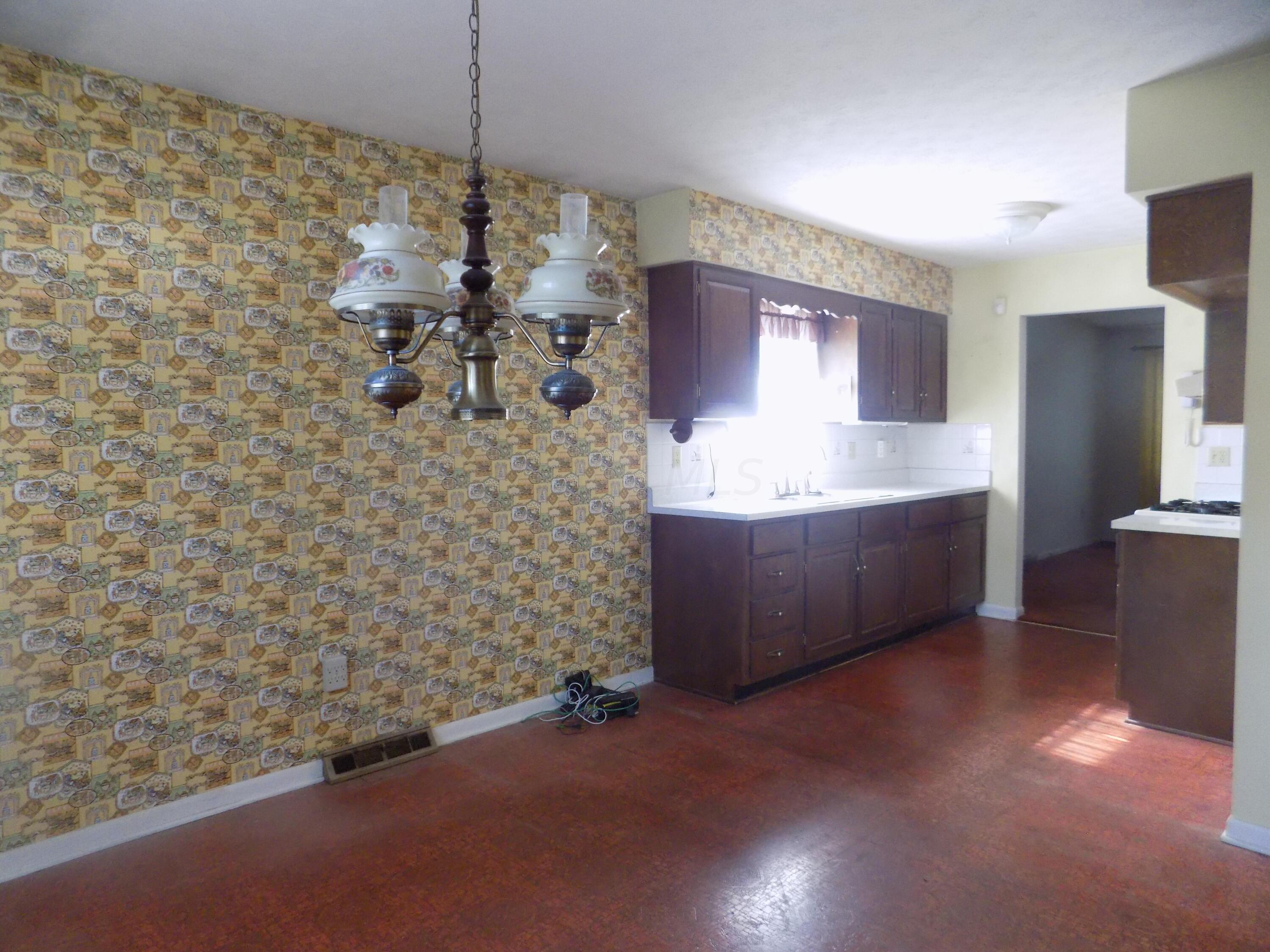 2100 Sale Road Columbus, OH 43224 - Photo 8 of 24 The kitchen offers a large eating space that overlooks the yard.