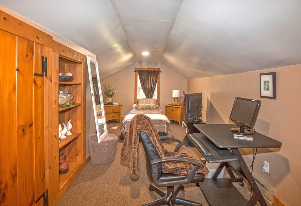 173 Cottage Road Enfield, CT 06082 - Photo 38 of 41 a view of a workspace with furniture and a window