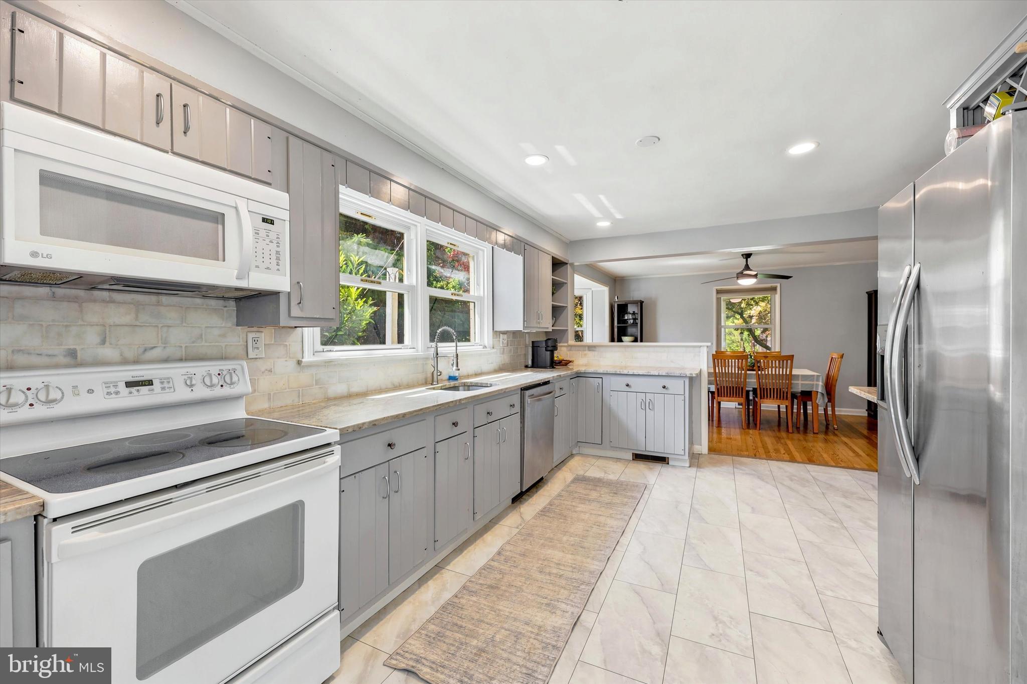 39 Haverford Road Ardmore, PA 19003 - Photo 9 of 24 a kitchen with a sink appliances and cabinets