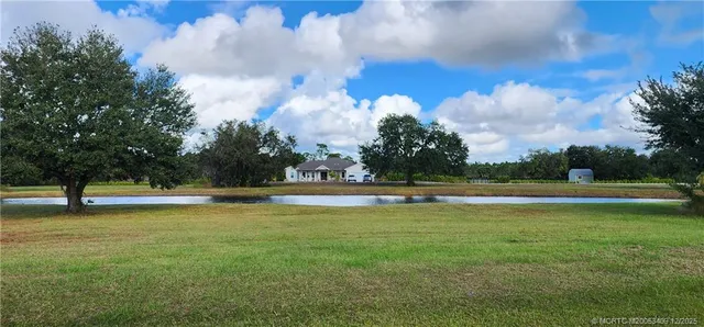 a bed room with a bed and a window