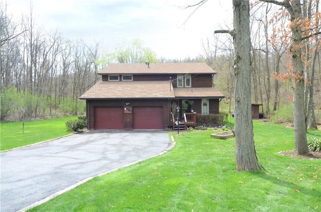 5639 Aiken Road McKees Rocks, PA 15136 - Photo 2 of 23 The extra large driveway allows for plenty of parking.
