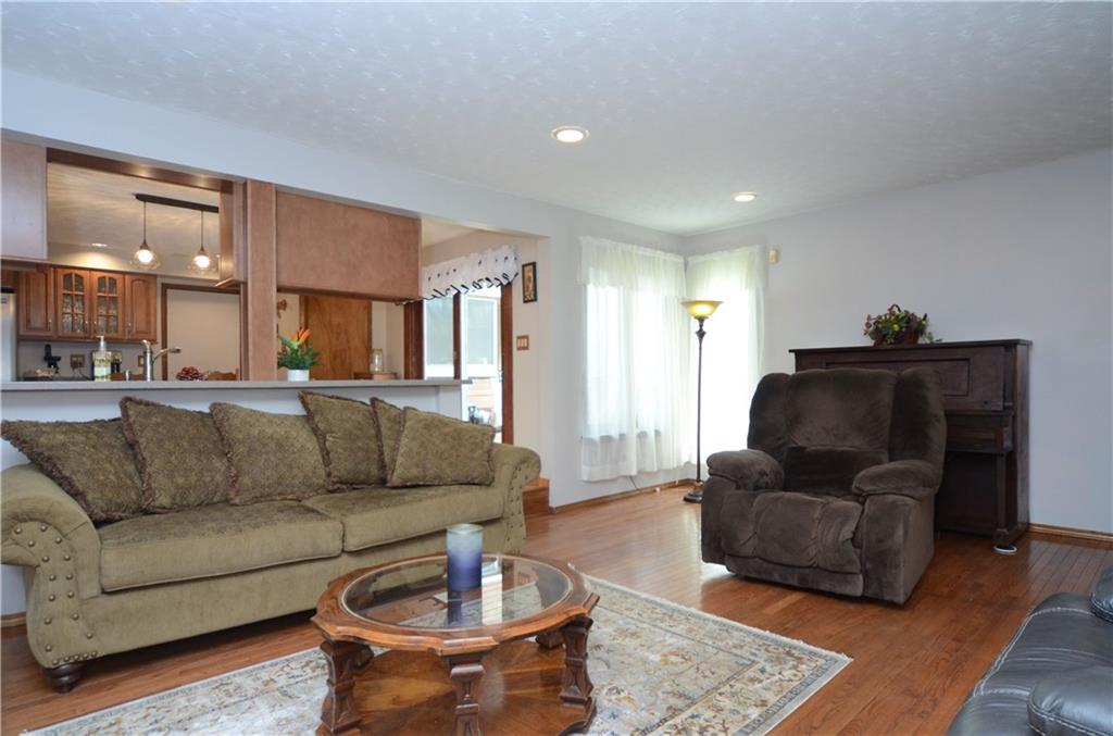 5639 Aiken Road McKees Rocks, PA 15136 - Photo 12 of 23 The family room opens into the kitchen.