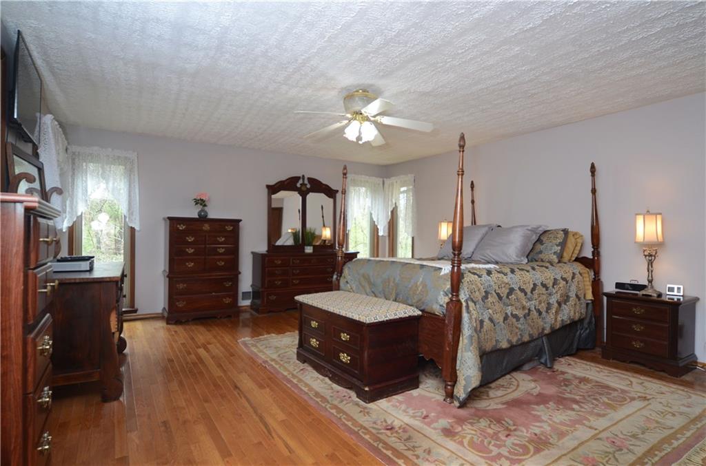 5639 Aiken Road McKees Rocks, PA 15136 - Photo 13 of 23 The large master bedroom includes hardwood floors.