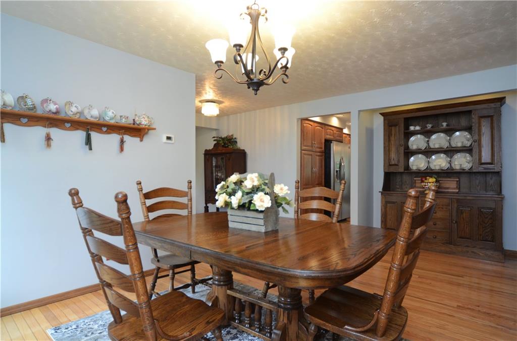5639 Aiken Road McKees Rocks, PA 15136 - Photo 7 of 23 The dining room offers hardwood floors and custom lighting.