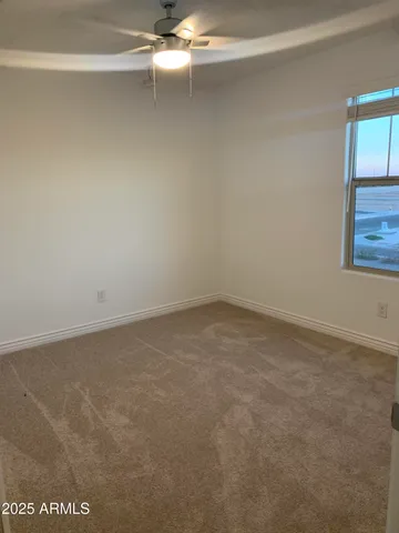 a kitchen with a table and chairs in it