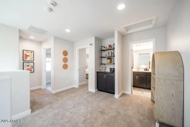 a view of a livingroom with a furniture and cabinet