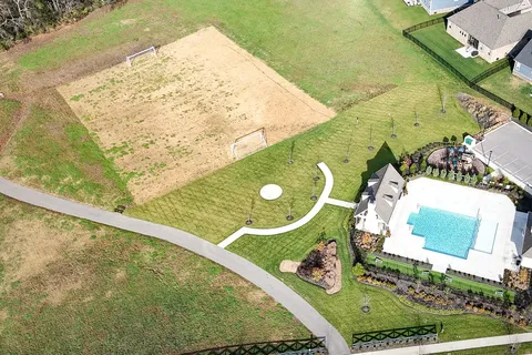 a view of swimming pool from a balcony
