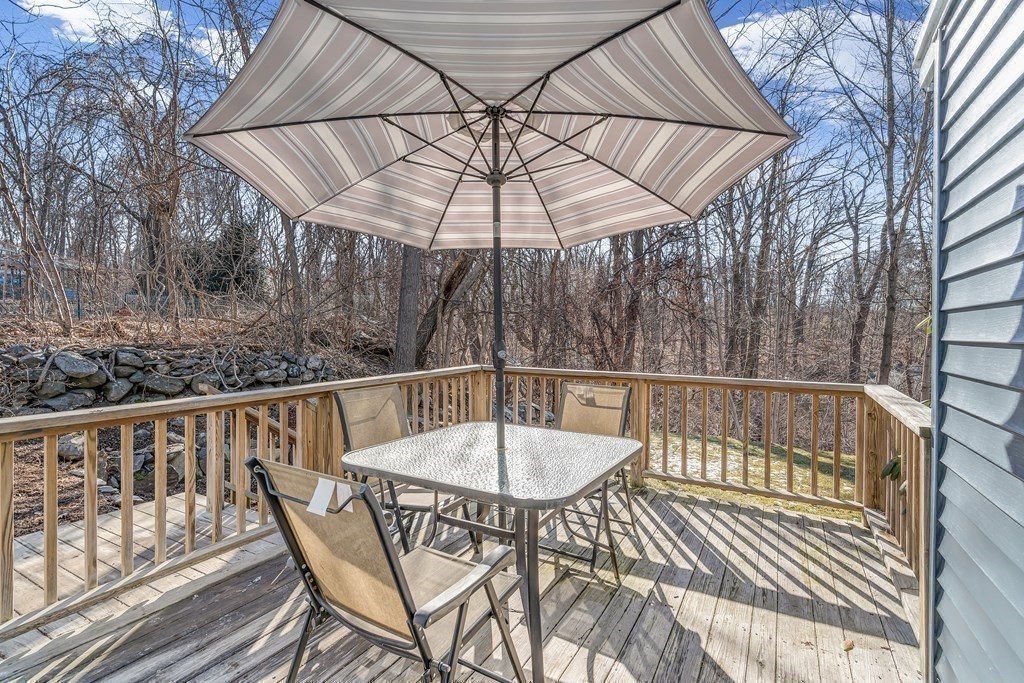 340 Berlin Road Marlborough, MA 01752 - Photo 16 of 42 a view of balcony with wooden floor and outdoor seating