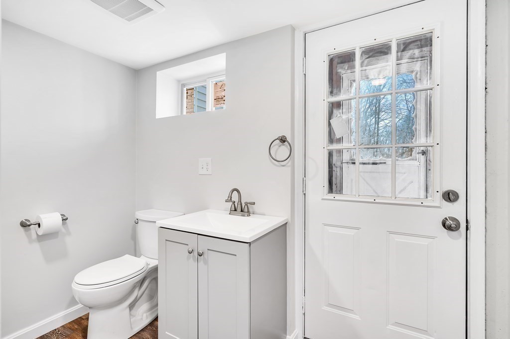 340 Berlin Road Marlborough, MA 01752 - Photo 31 of 42 a white toilet sitting next to a bathroom sink