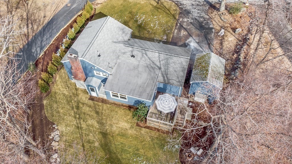 340 Berlin Road Marlborough, MA 01752 - Photo 6 of 42 a view of a house with a backyard