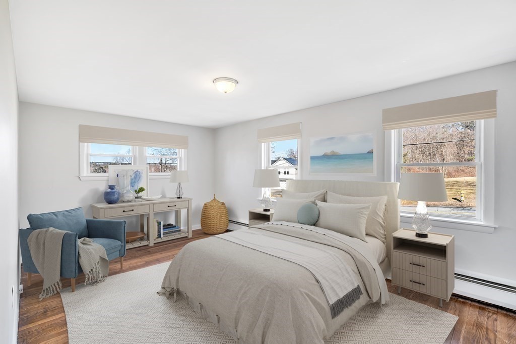 340 Berlin Road Marlborough, MA 01752 - Photo 10 of 42 a bedroom with a bed and a couch