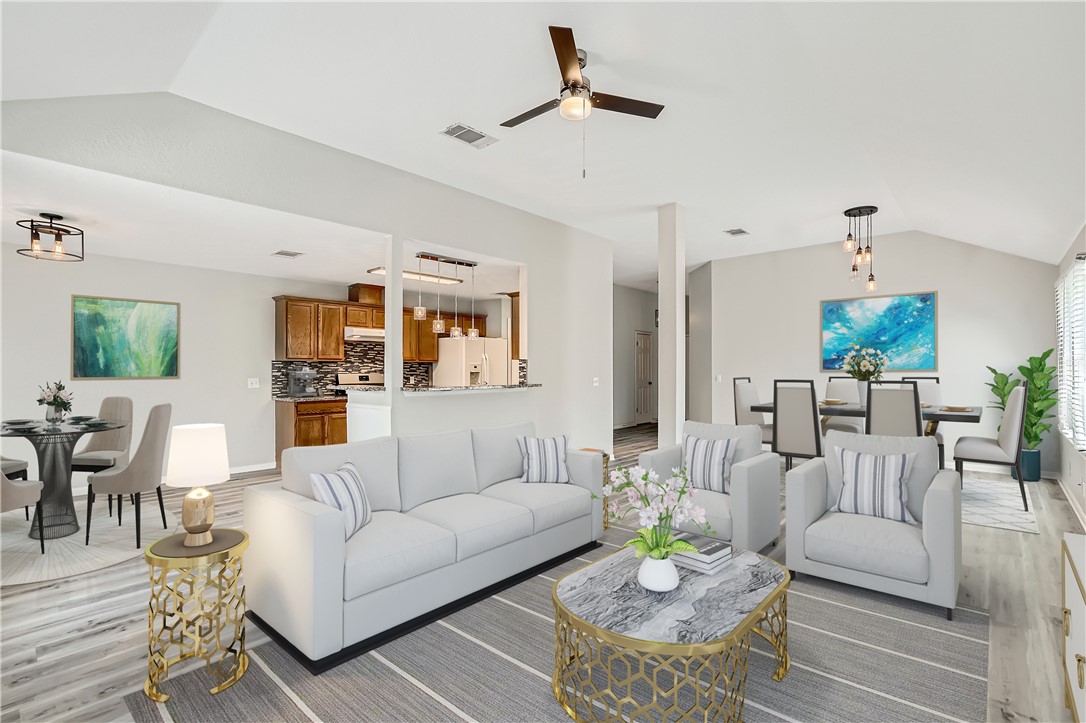 102 Evergreen Circle Georgetown, TX 78626 - Photo 1 of 33 a living room with furniture and wooden floor